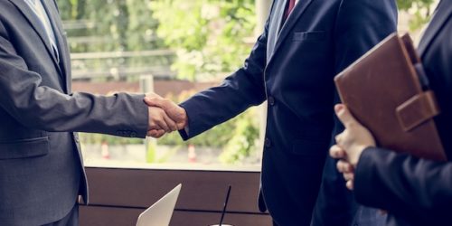 Japanese businessmen having an agreement Japanese businessmen having an agreement